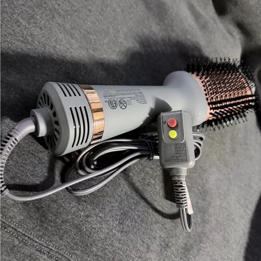 Sleek Pink and Gray Hair Dryer Brush